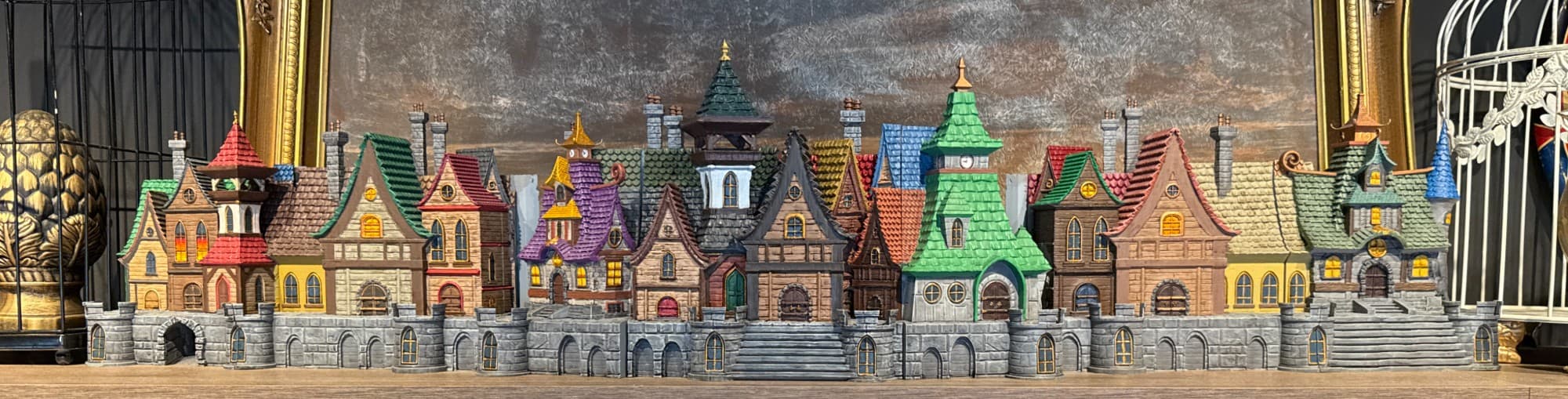 Furhaven GM Screen after a customer hand-painted it — full town skyline in colour