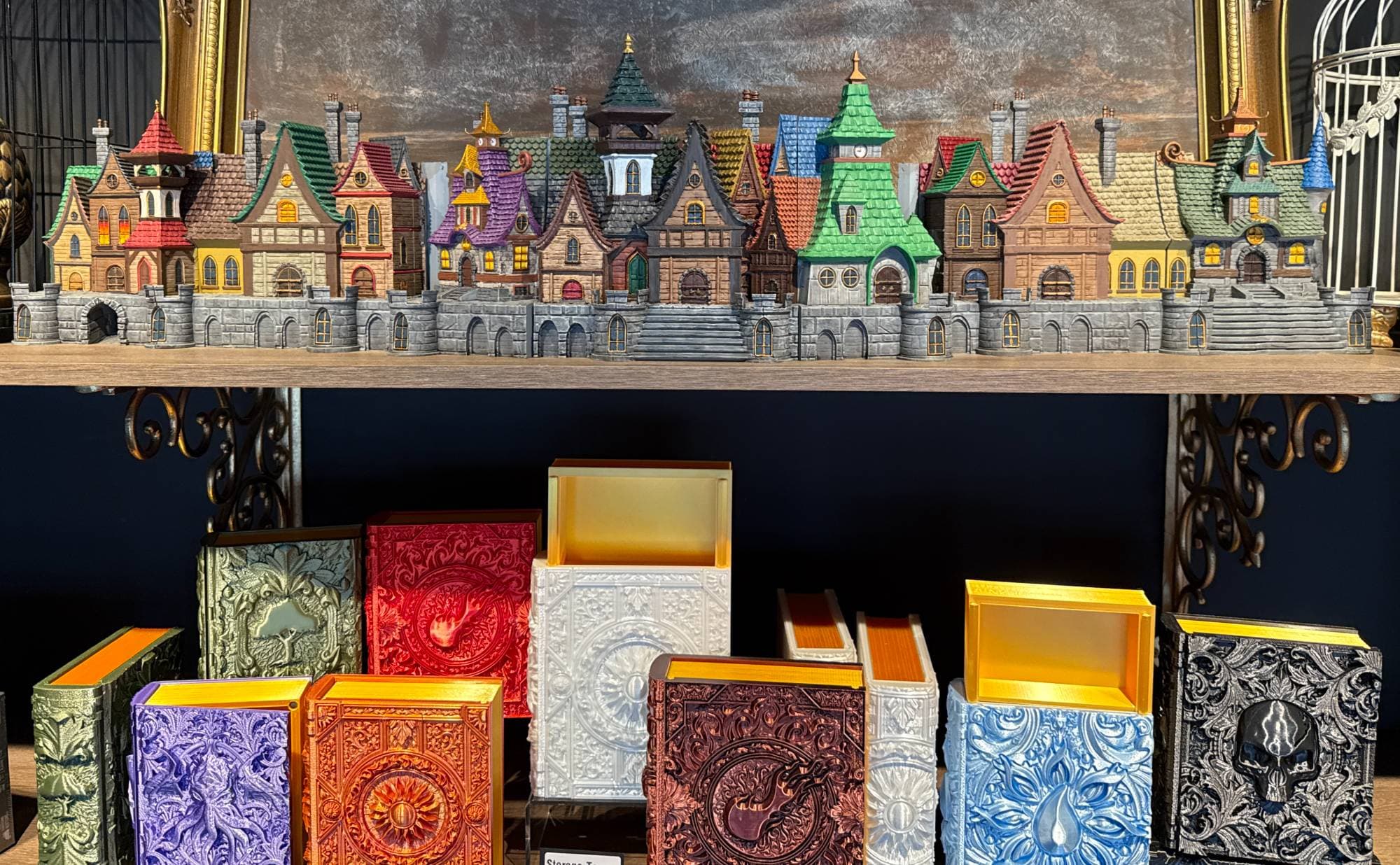 Furhaven GM Screen displayed on a shelf above a row of printed tomes